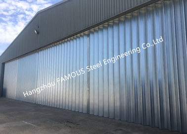 China Stable Triangular Seal Vertical Hinged Door Sectional Leaves Folding Sliding Hangar Doors supplier